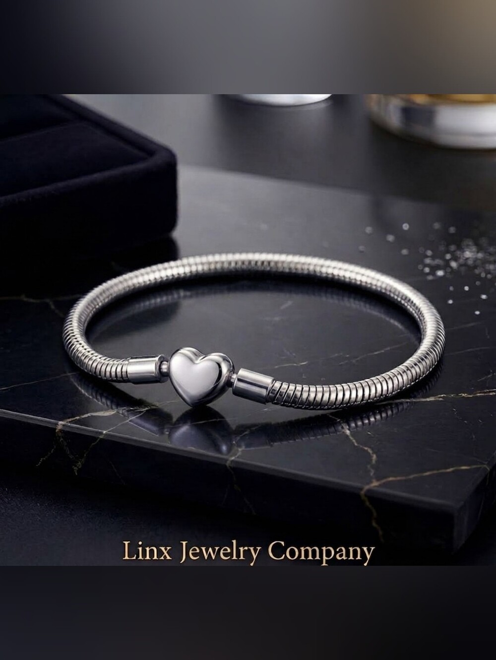 Linx Snake Chain Charm Bracelet With Heart Clasp